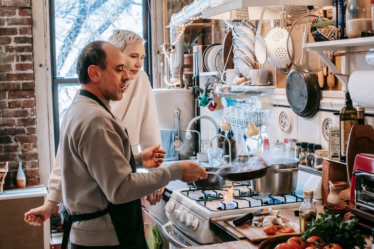 A man cooking in his kitchen